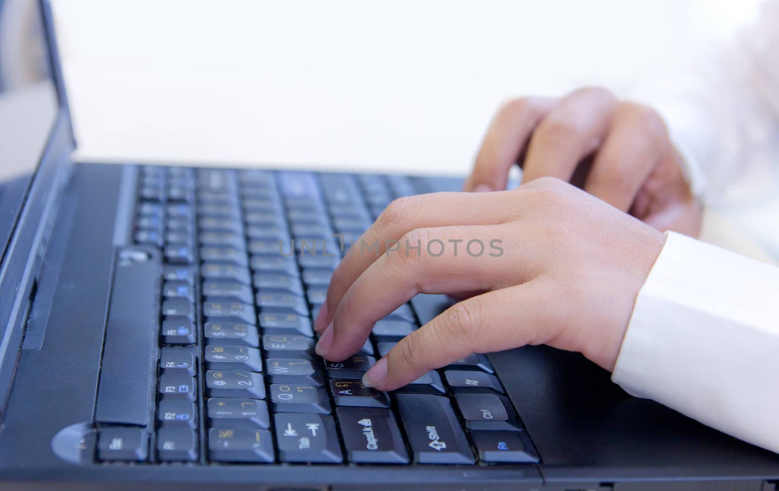 woman hand typing on notebook keyboard