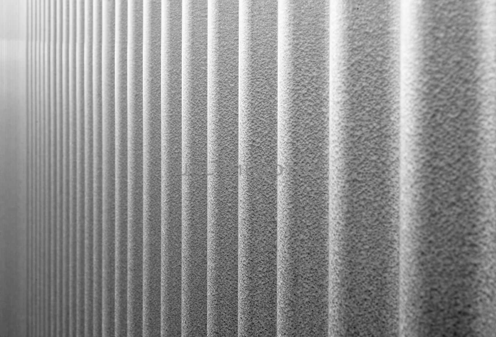 Vulcanized corrugated steel wall that looks like it diminished to infinity