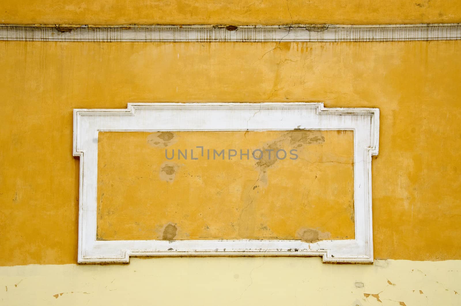 Background of ancient wall architecture. Collapsing retro vintage yellow backdrop.