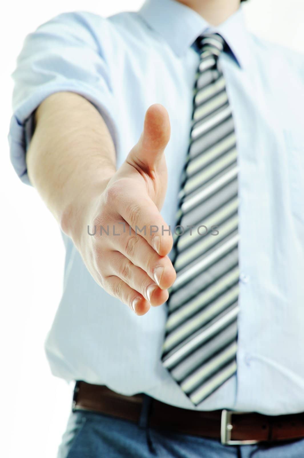 Businessman offering for handshake by velkol