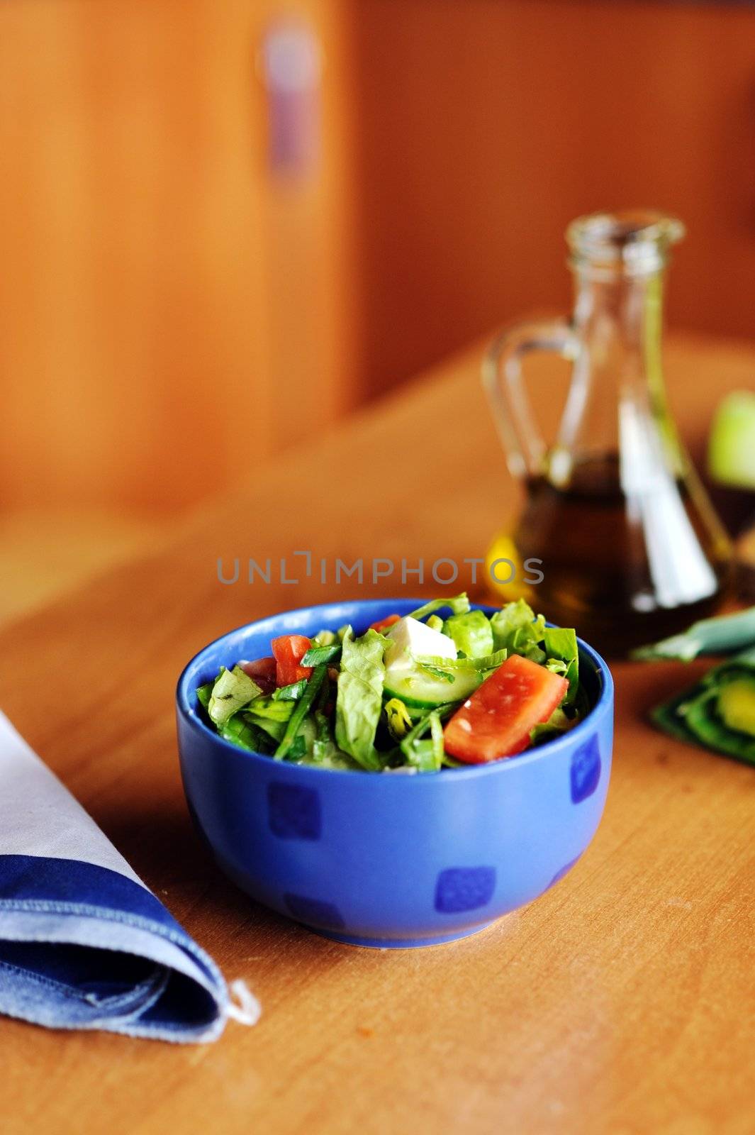 An image of a bowl of fresh tasty salad