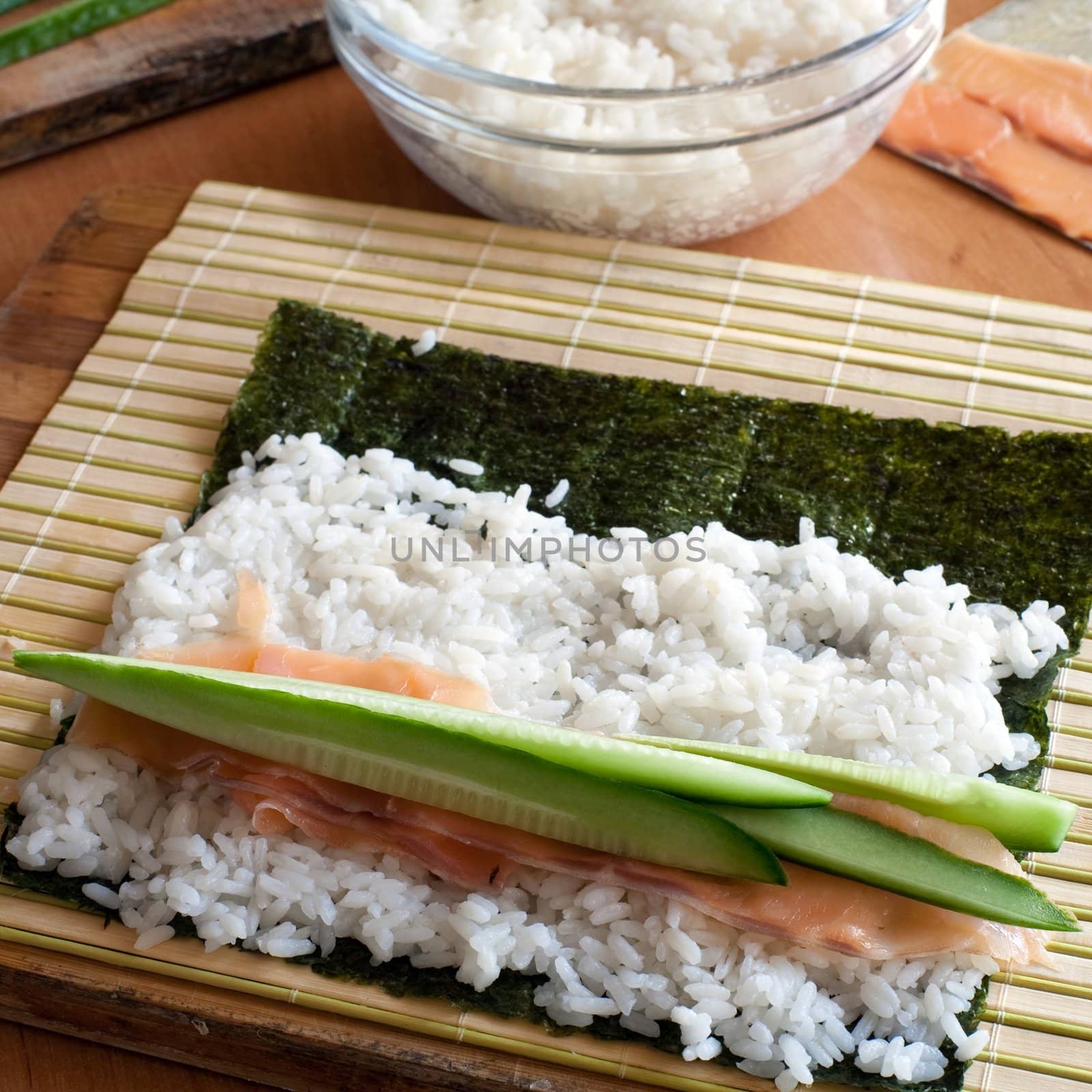 An image of tuna and cucumber on rice