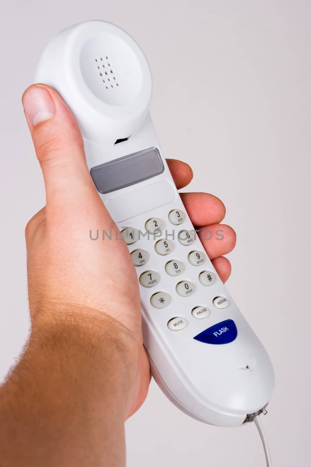 An image of telephone in mans hand