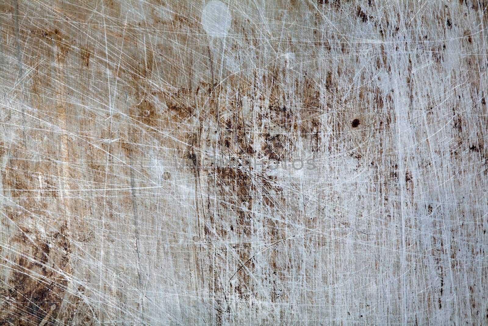 An image of a background of scratched rusty metal