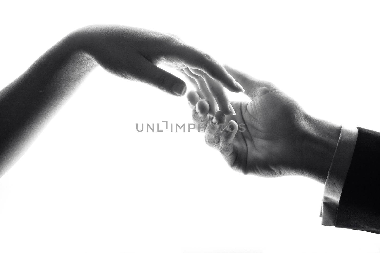 An image of silhouette of hands. Man and woman.