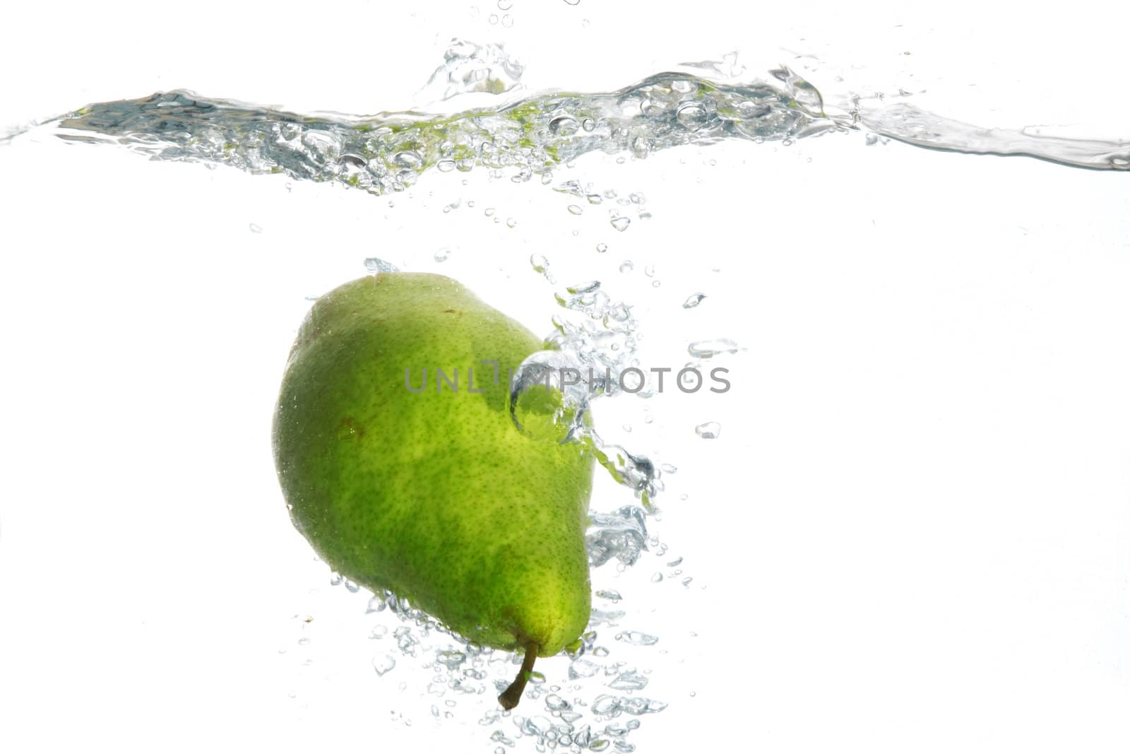 Green pear in water by velkol