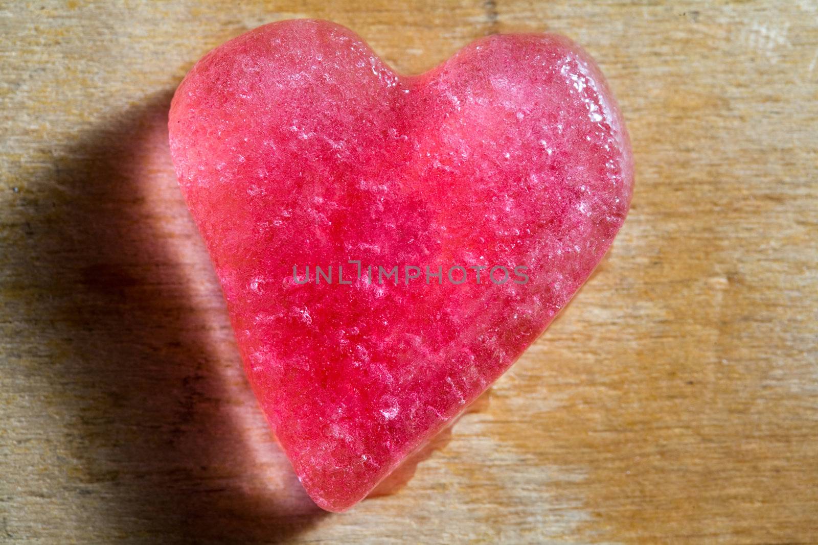 Stock photo: an image of a red heart of ice