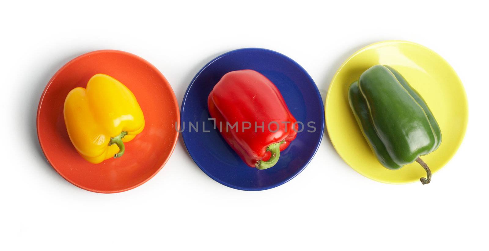 An image of color vegetables on a saucers