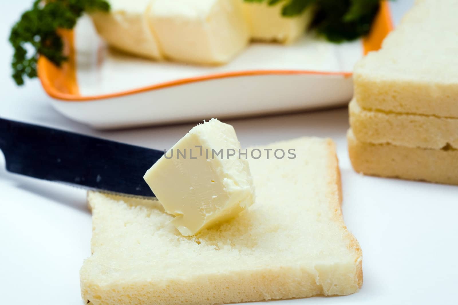 Stock photo: an image of light breakfast of bread and butter