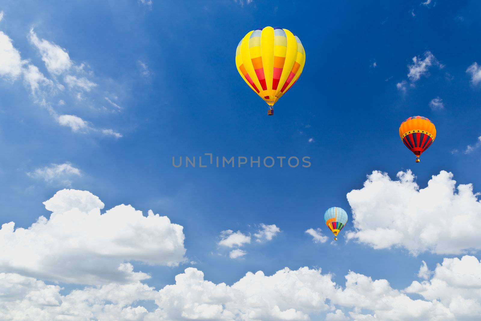 colorful hot air balloons in blue sky by tungphoto