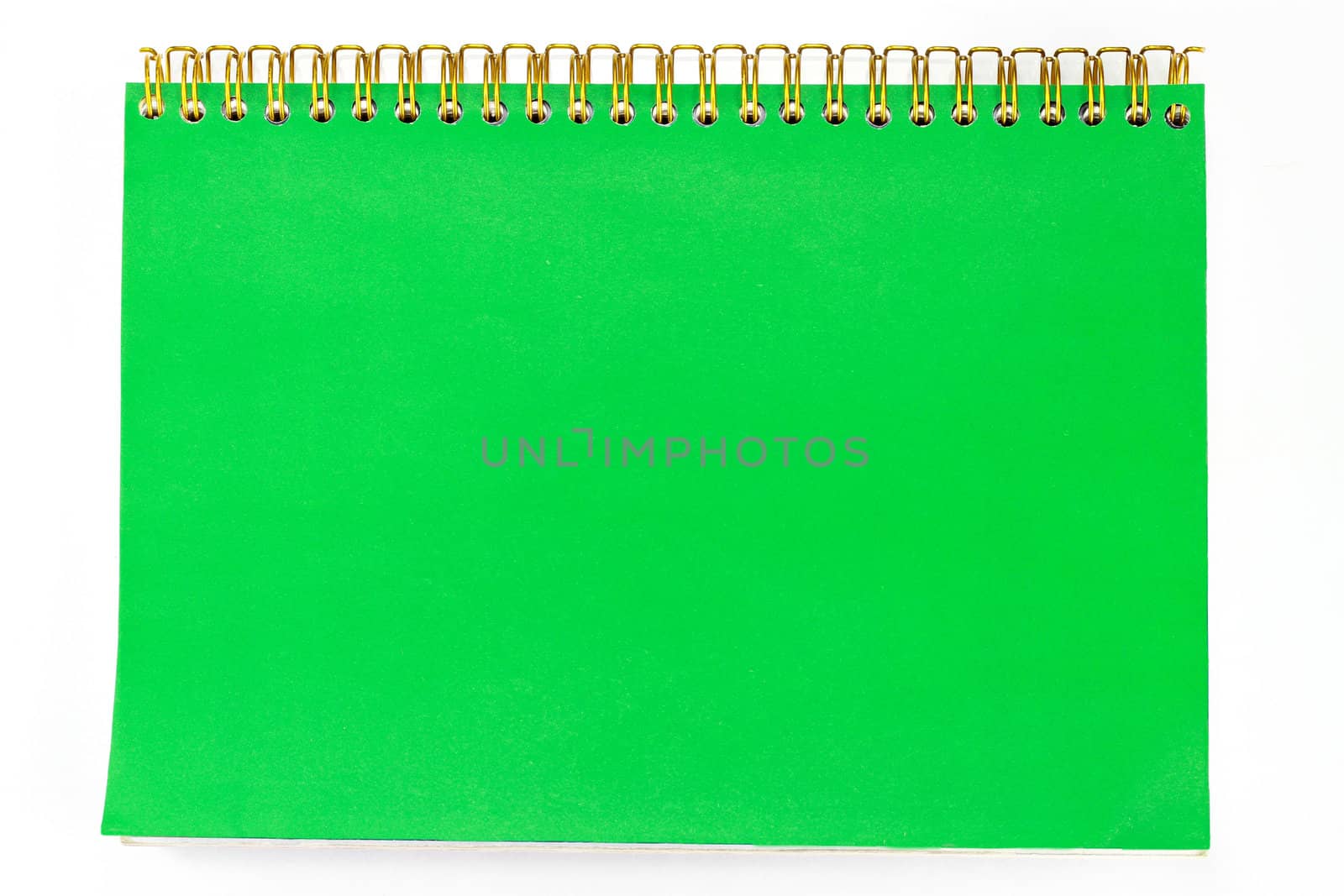 closes up of a blank green notebook
