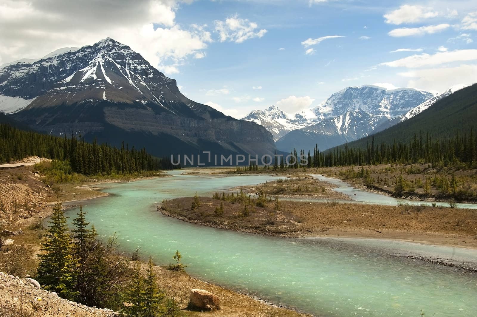 the river flowing at the foot of the Canadian Rockies