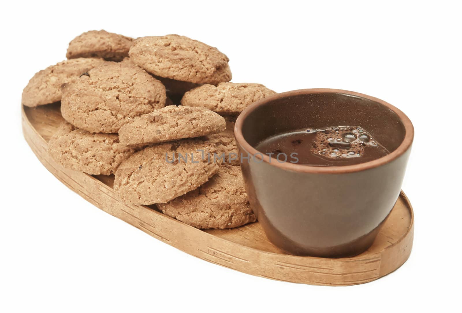 fresh cookie and warm cacao to morning meal on wooden tray