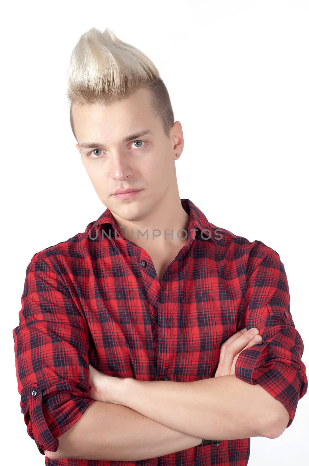 Young man with hands folded on white