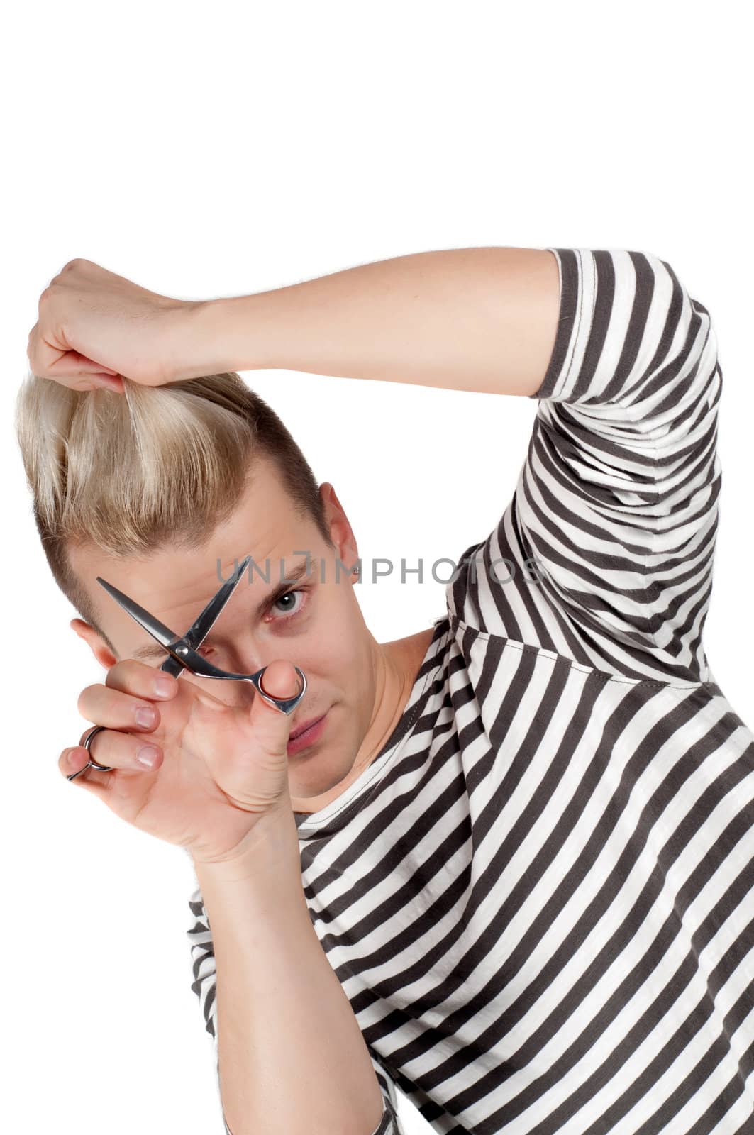 Portrait of handsome man with scissors in studio isolated on white