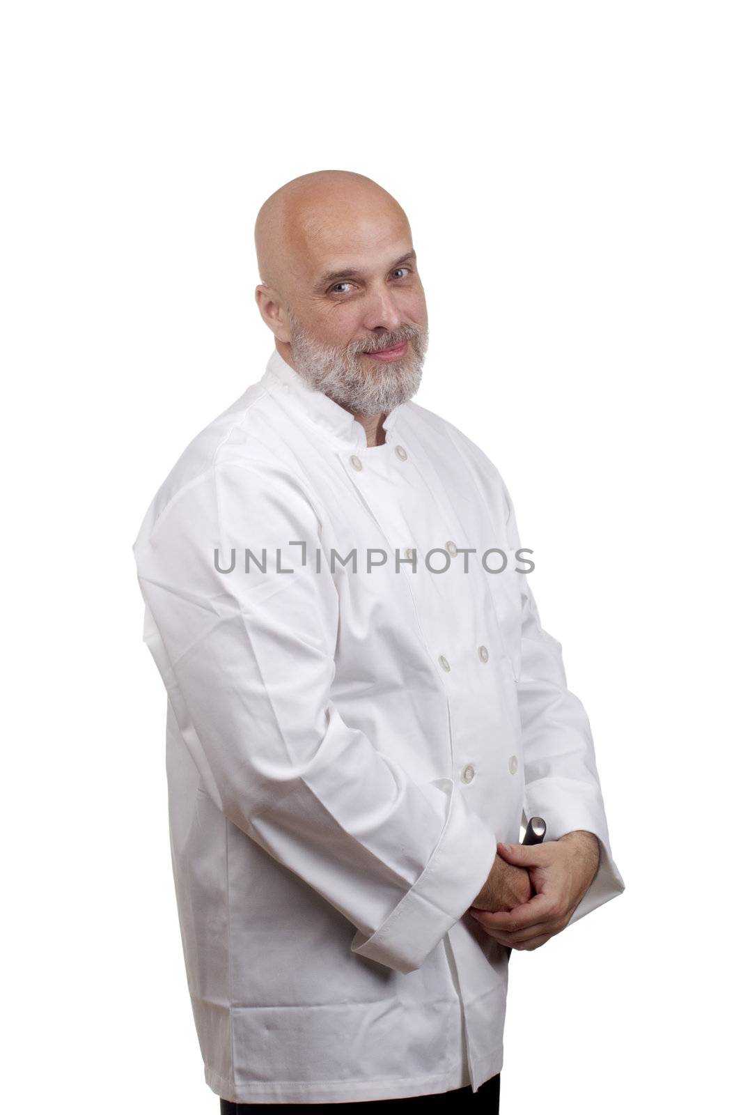 Portrait of a caucasian chef in his uniform on a white background.