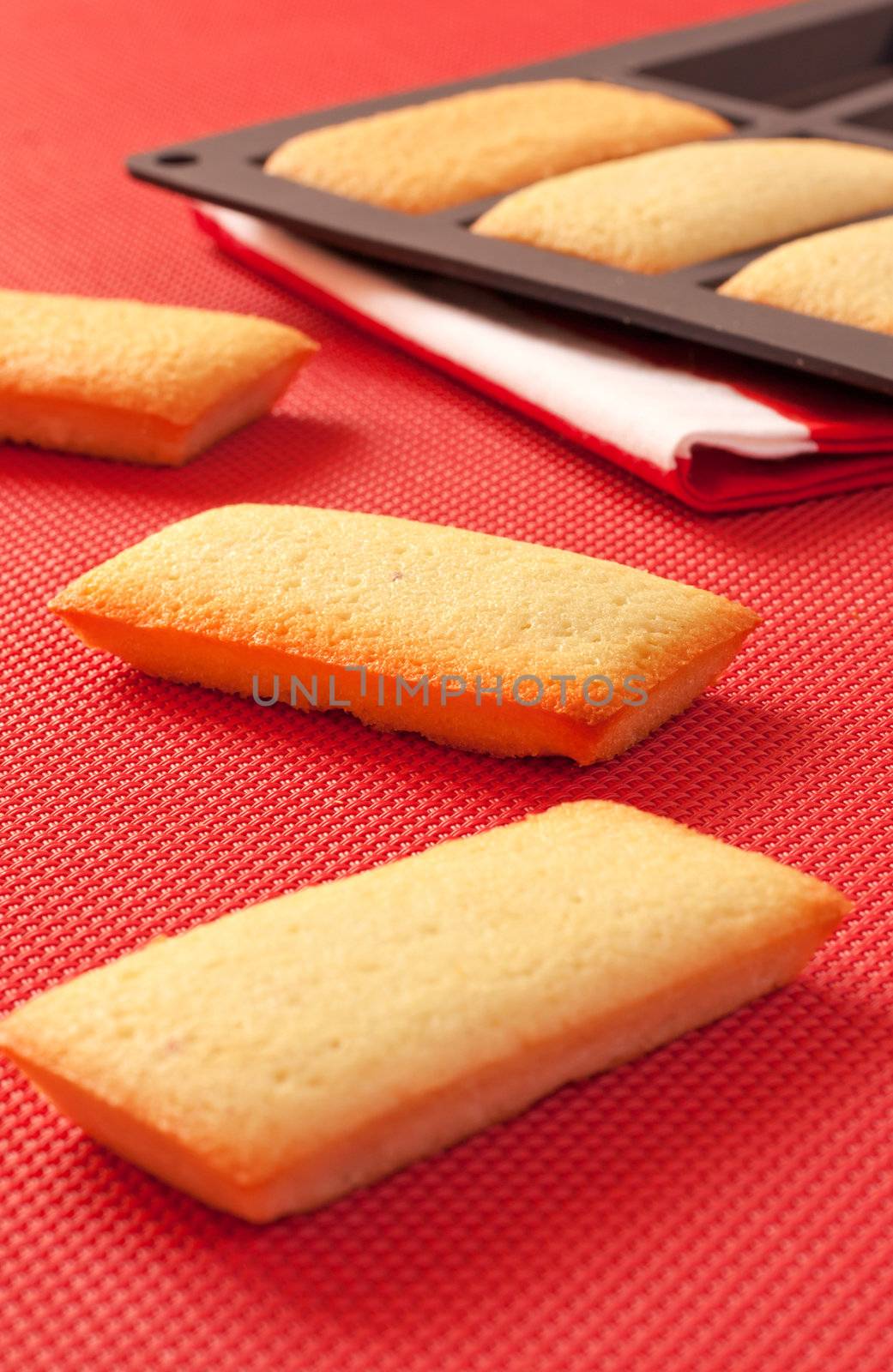 French biscuits called Financiers, with almond powder, smooth inside and crispy on the edges