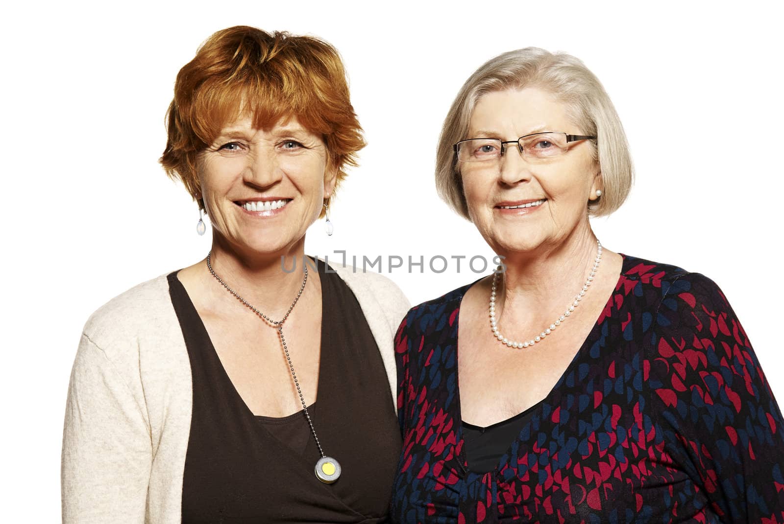 Studio shot of two women. Mother and Daughter.