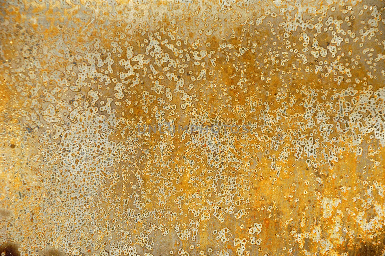 Grungy abstract background of metal. From a burnt out car.