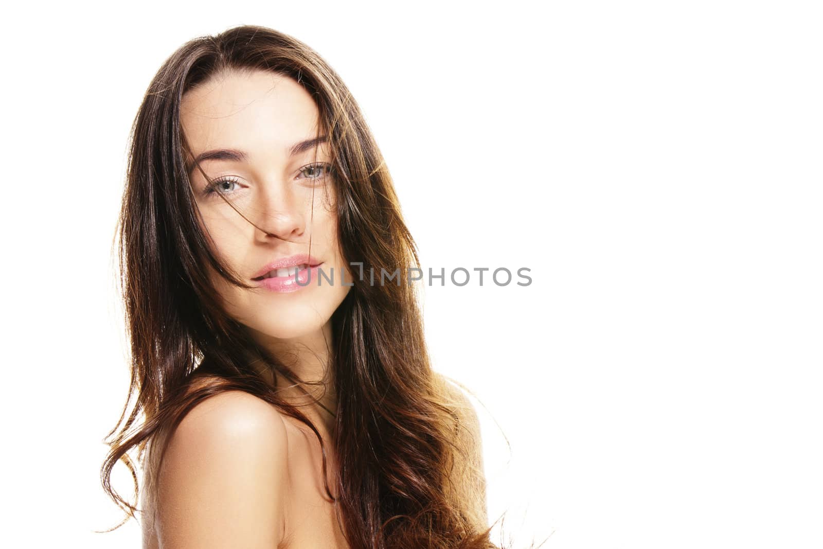 beautiful woman with unkempt hair on white background