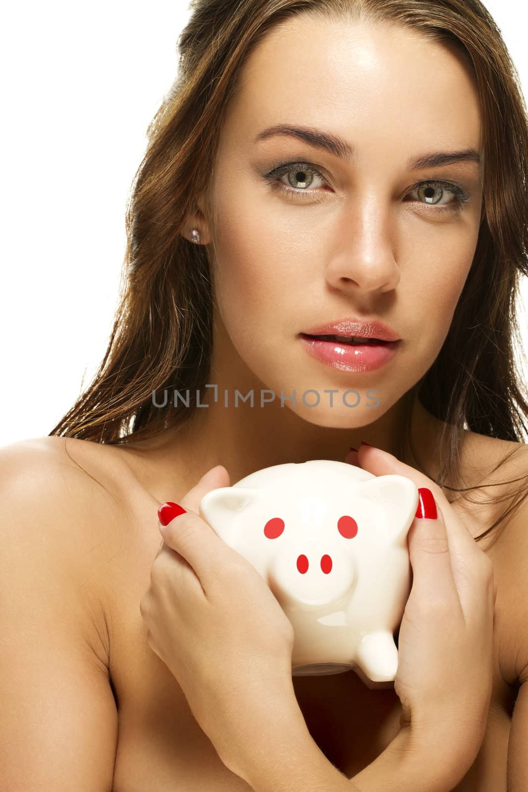 beautiful woman holding piggy bank on white background
