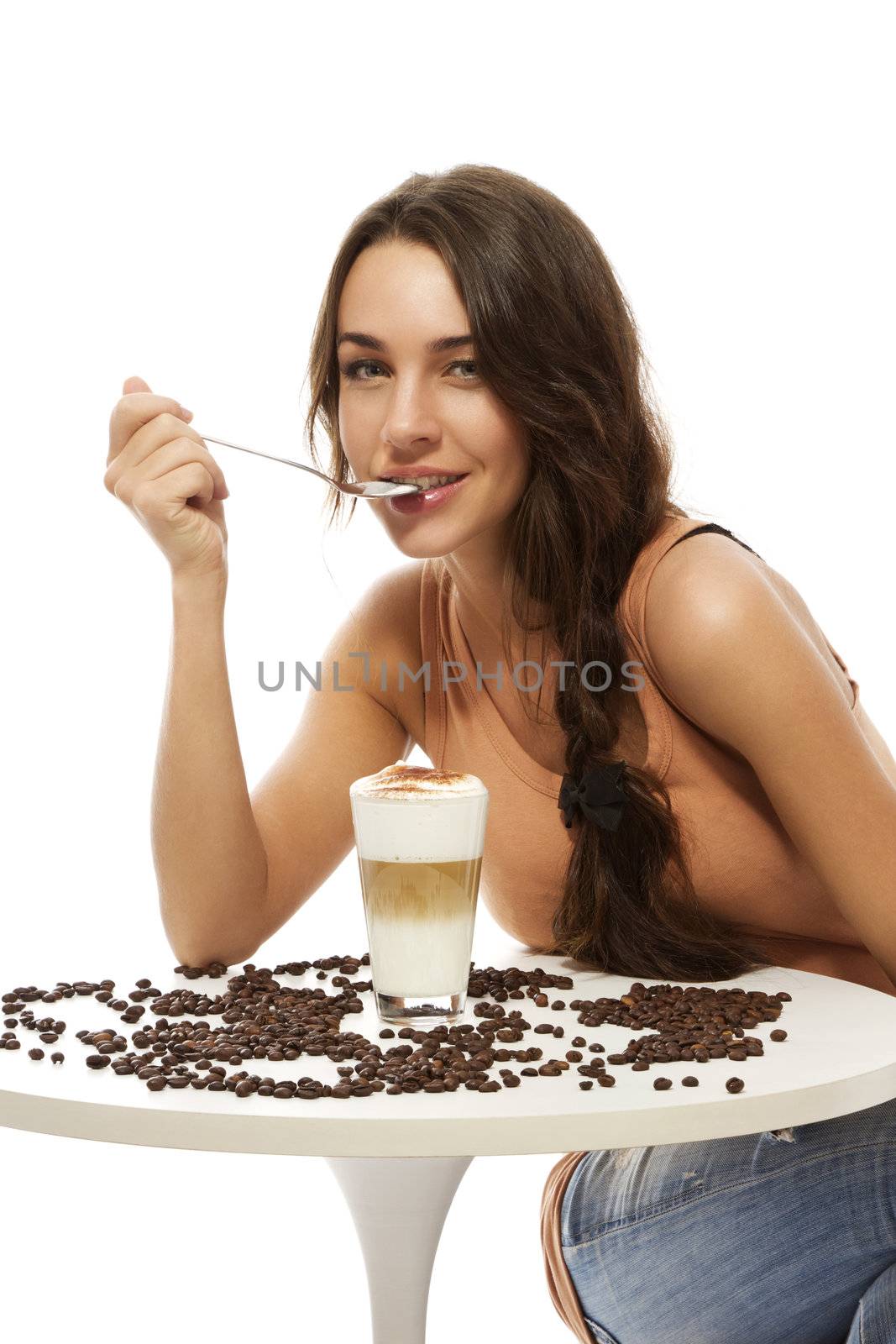 beautiful happy woman at a table with latte macchiato by RobStark