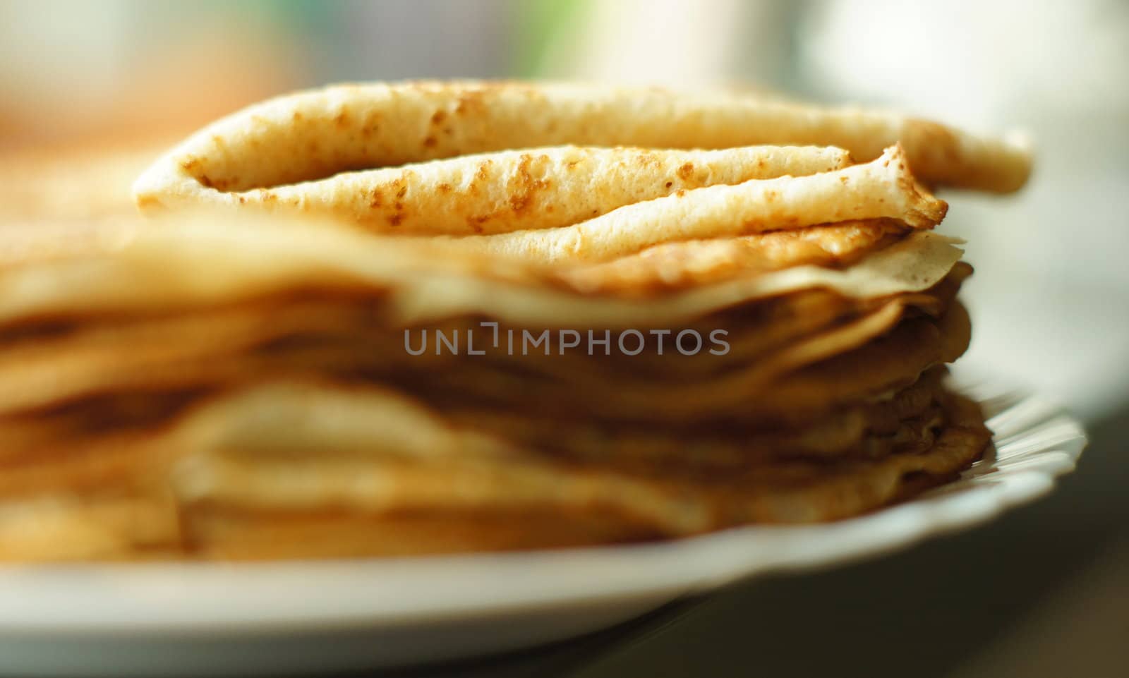 bunch of pancakes on a plate