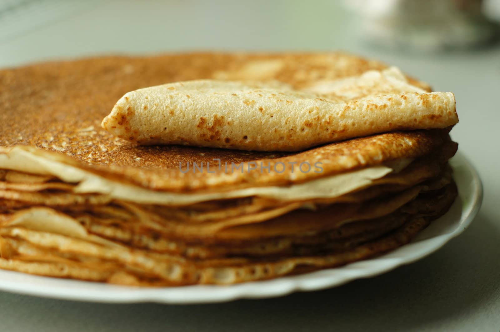 bunch of pancakes on a plate