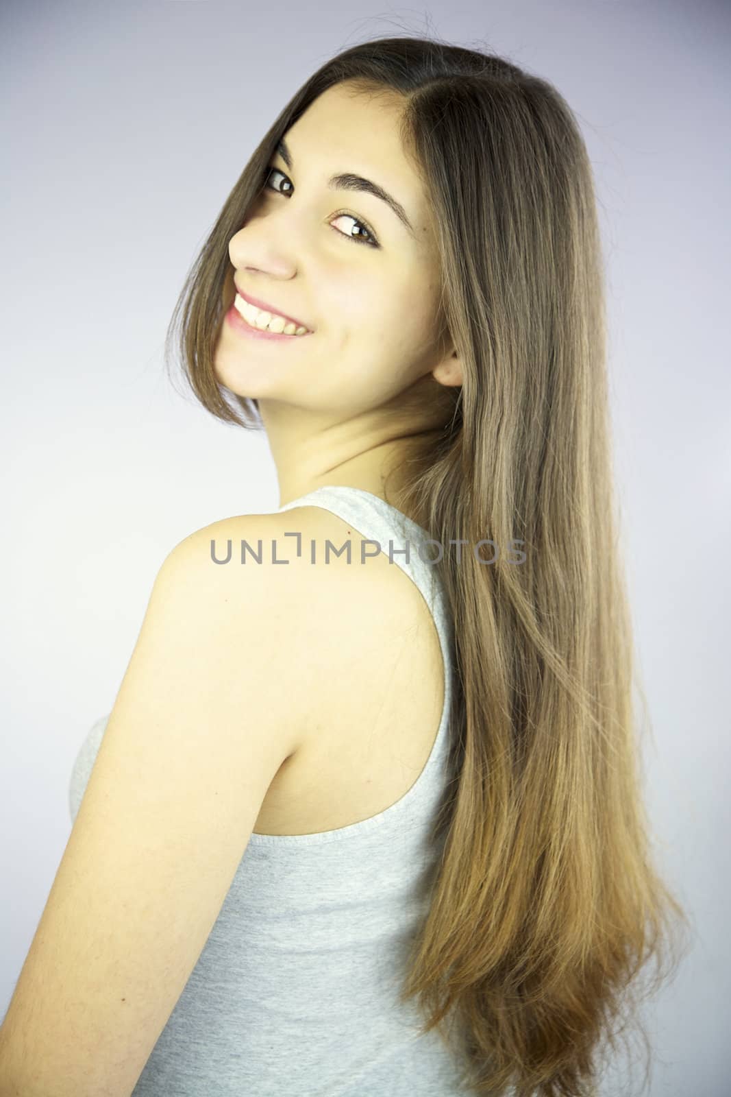 Brunette with long hair smiling happy by fmarsicano