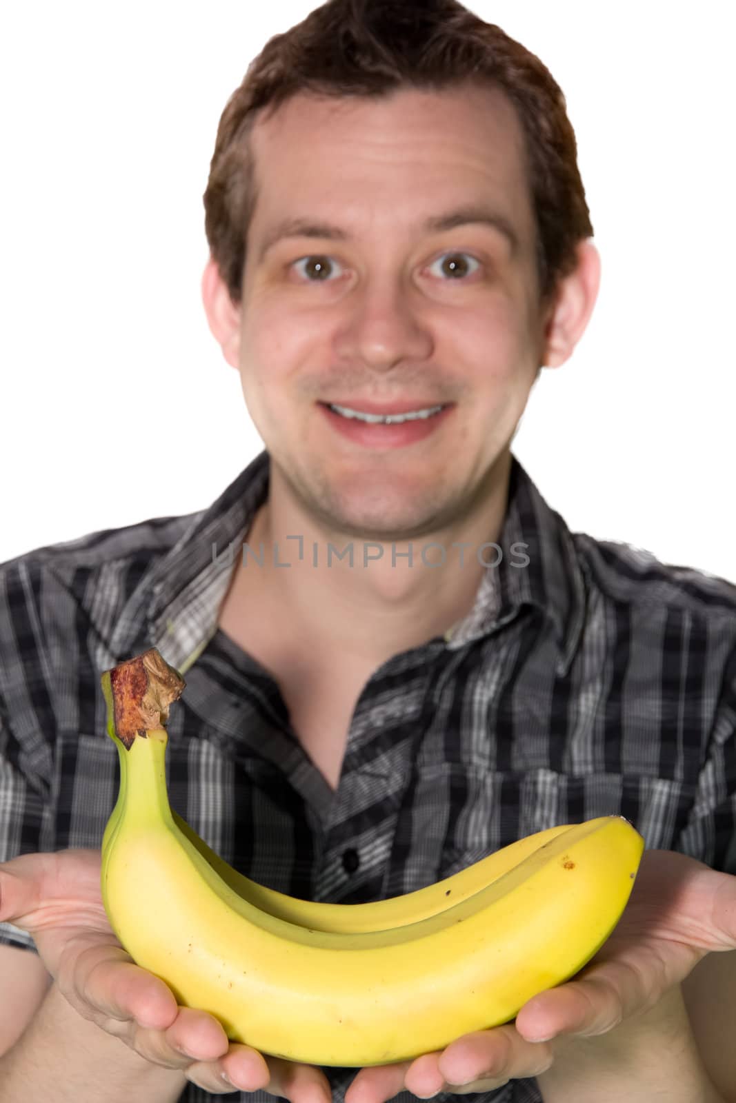 Picture of a man giving a banana to someone