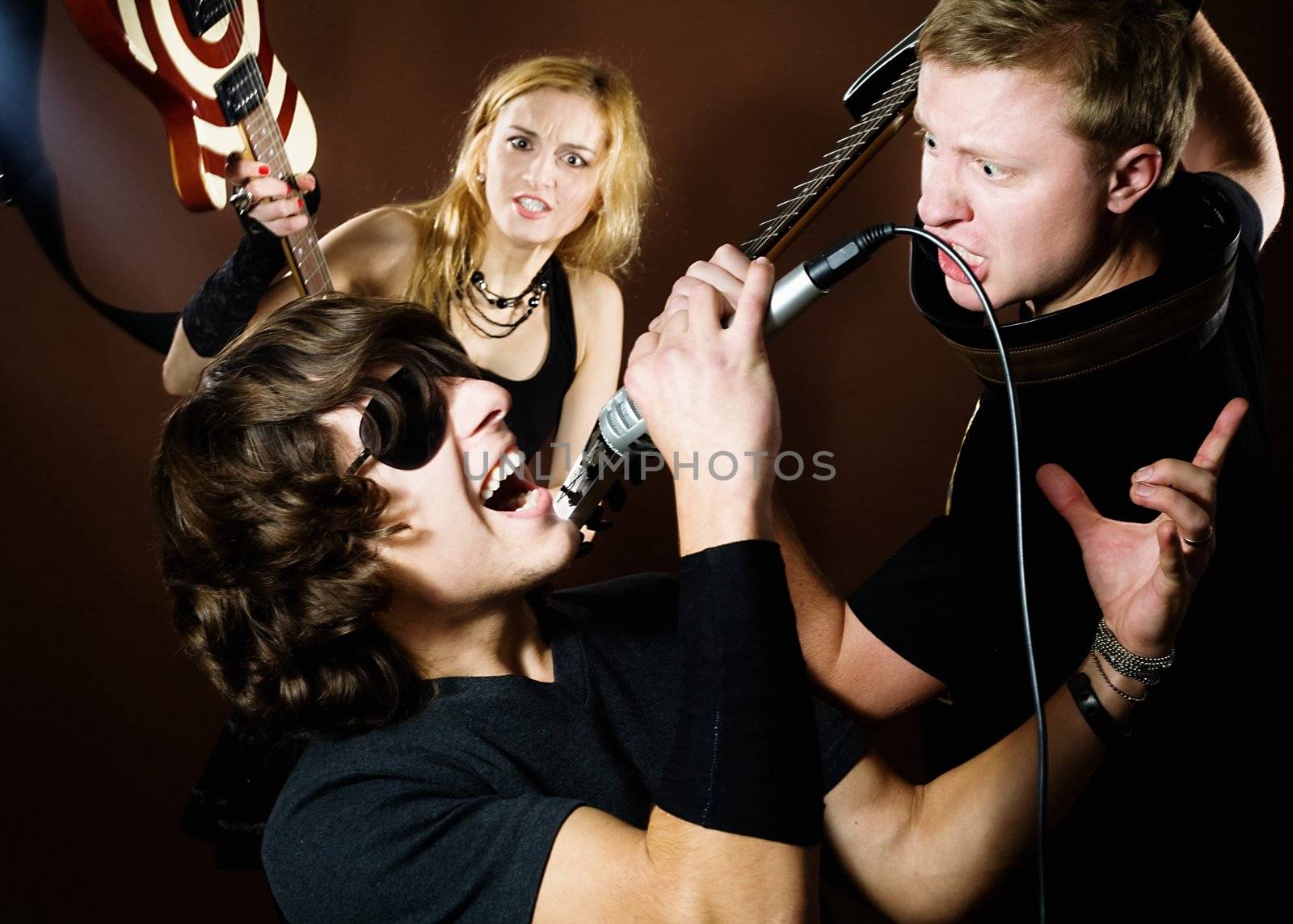 Rock band performance in photostudio