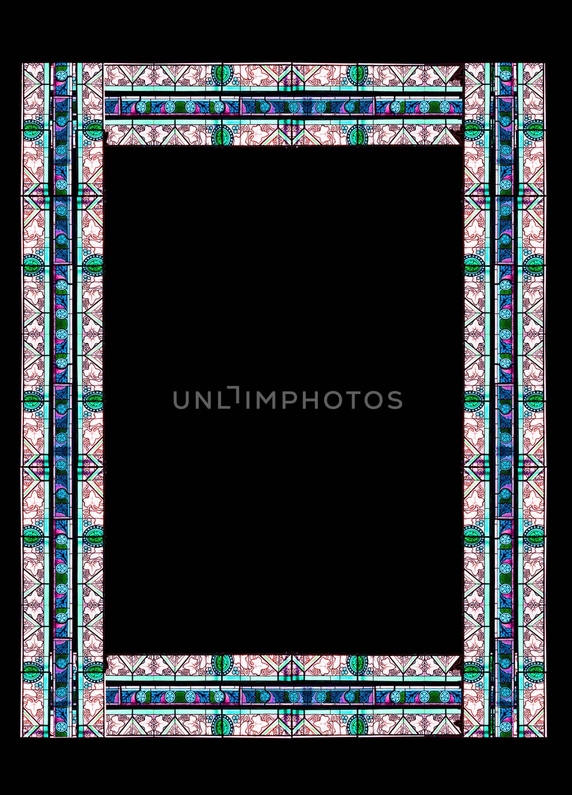 Stained glass frame with floral colored motifs on borders isolated on black (with clipping path)