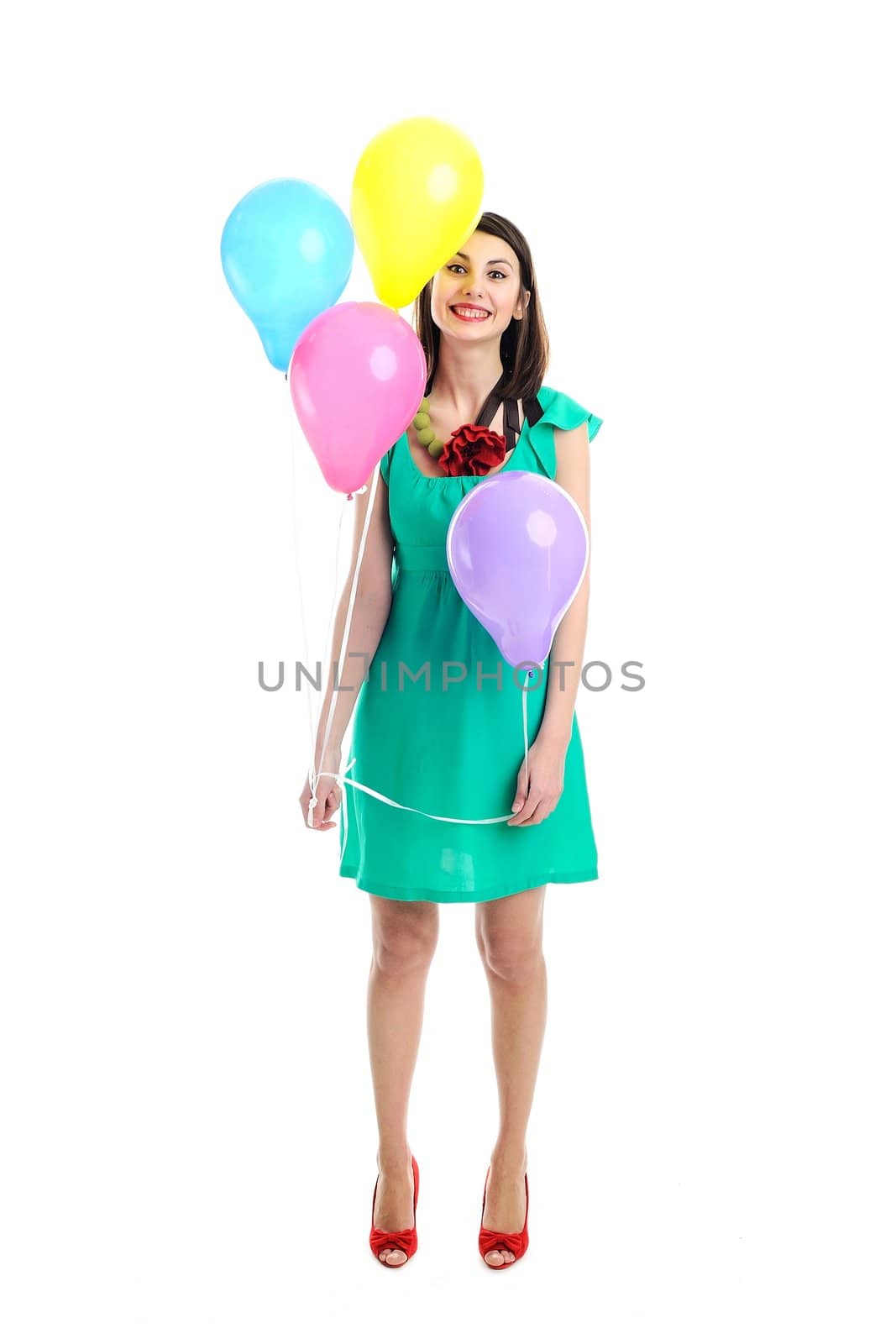 An image of young woman with birthday balloons