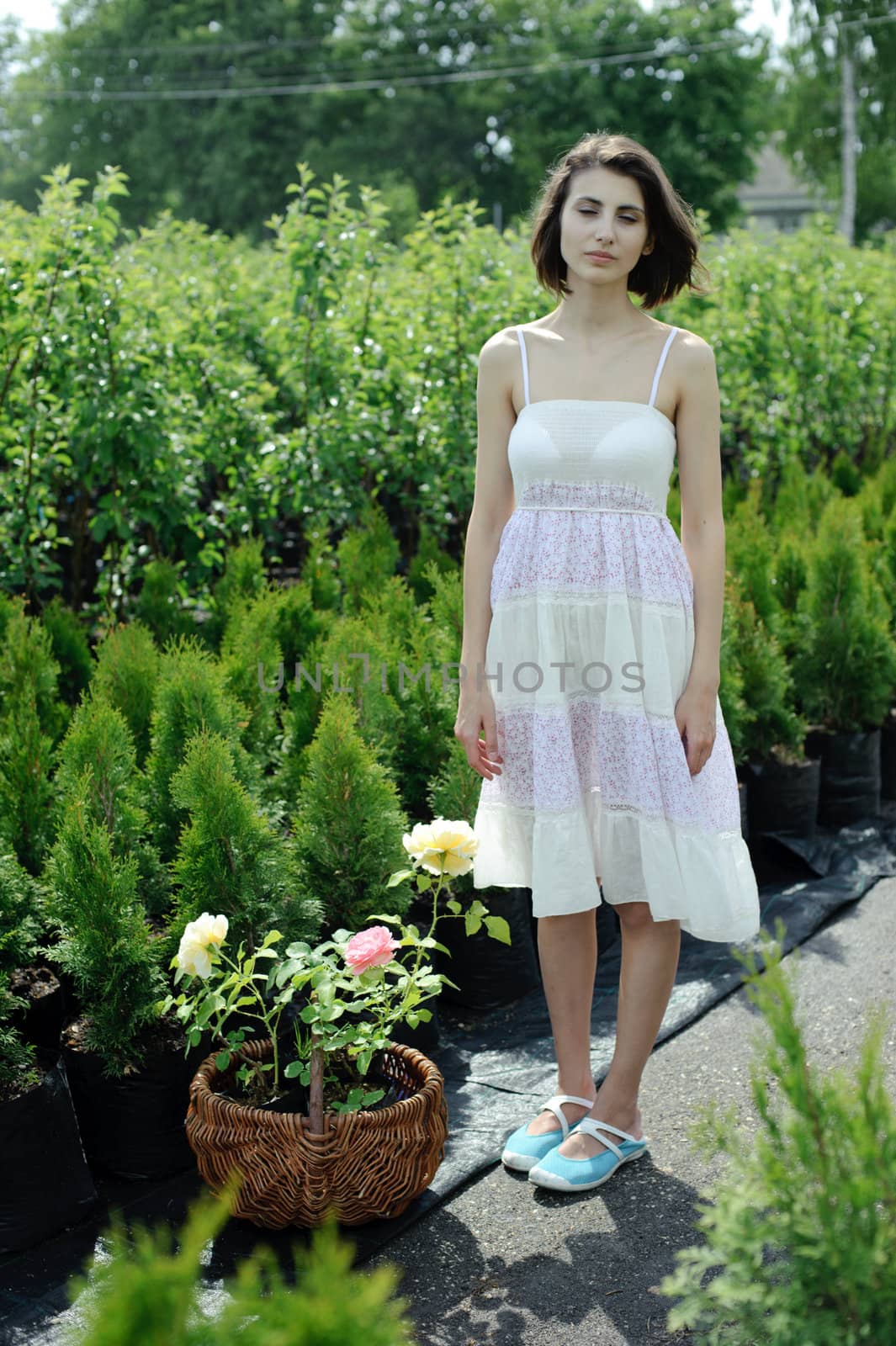 An image of a young girl in the garden
