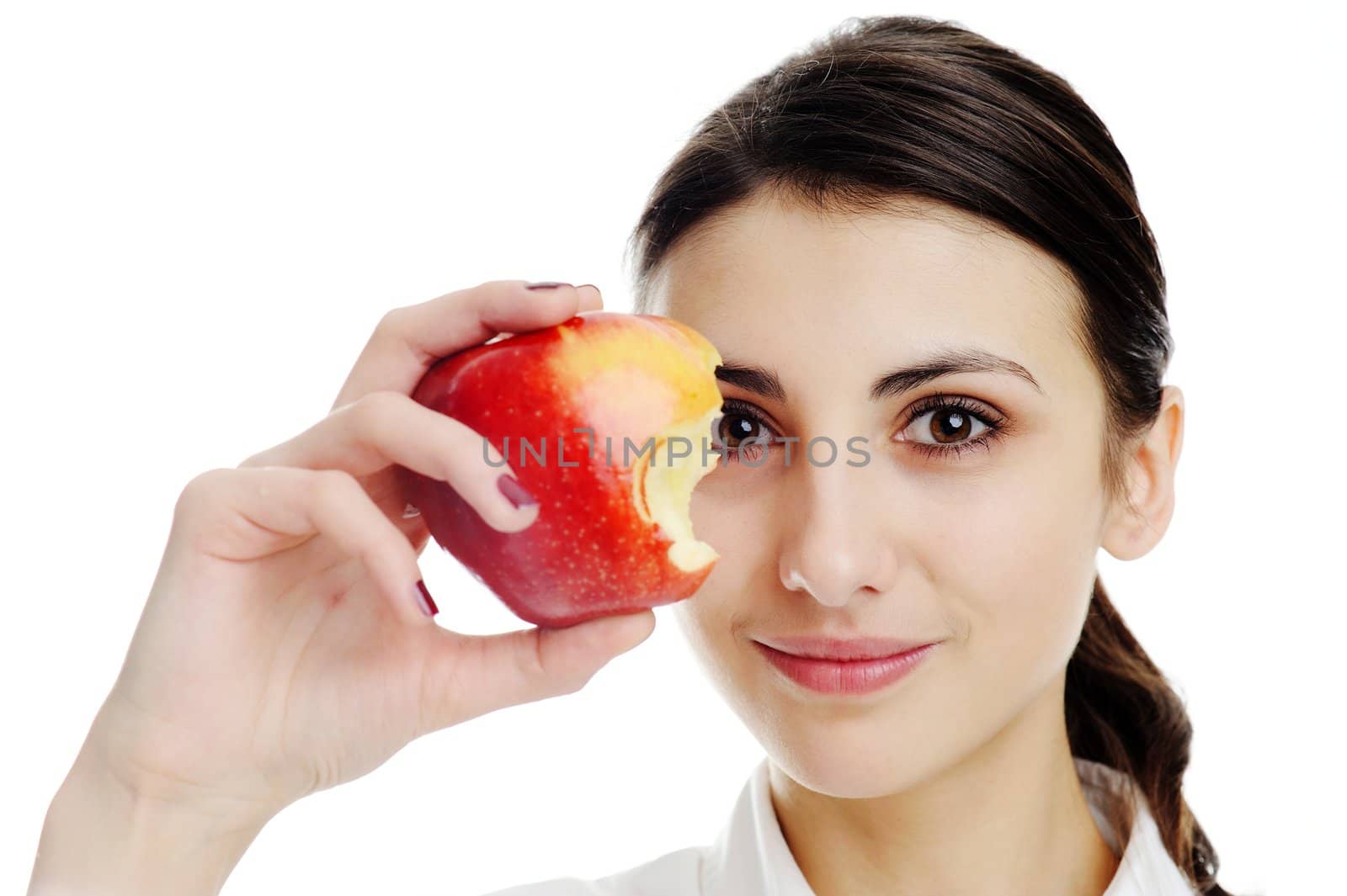 An image of beautiful woman eats an apple