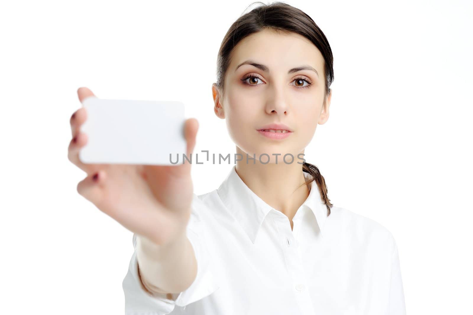 Young businesswoman holding blank businesscard in hand