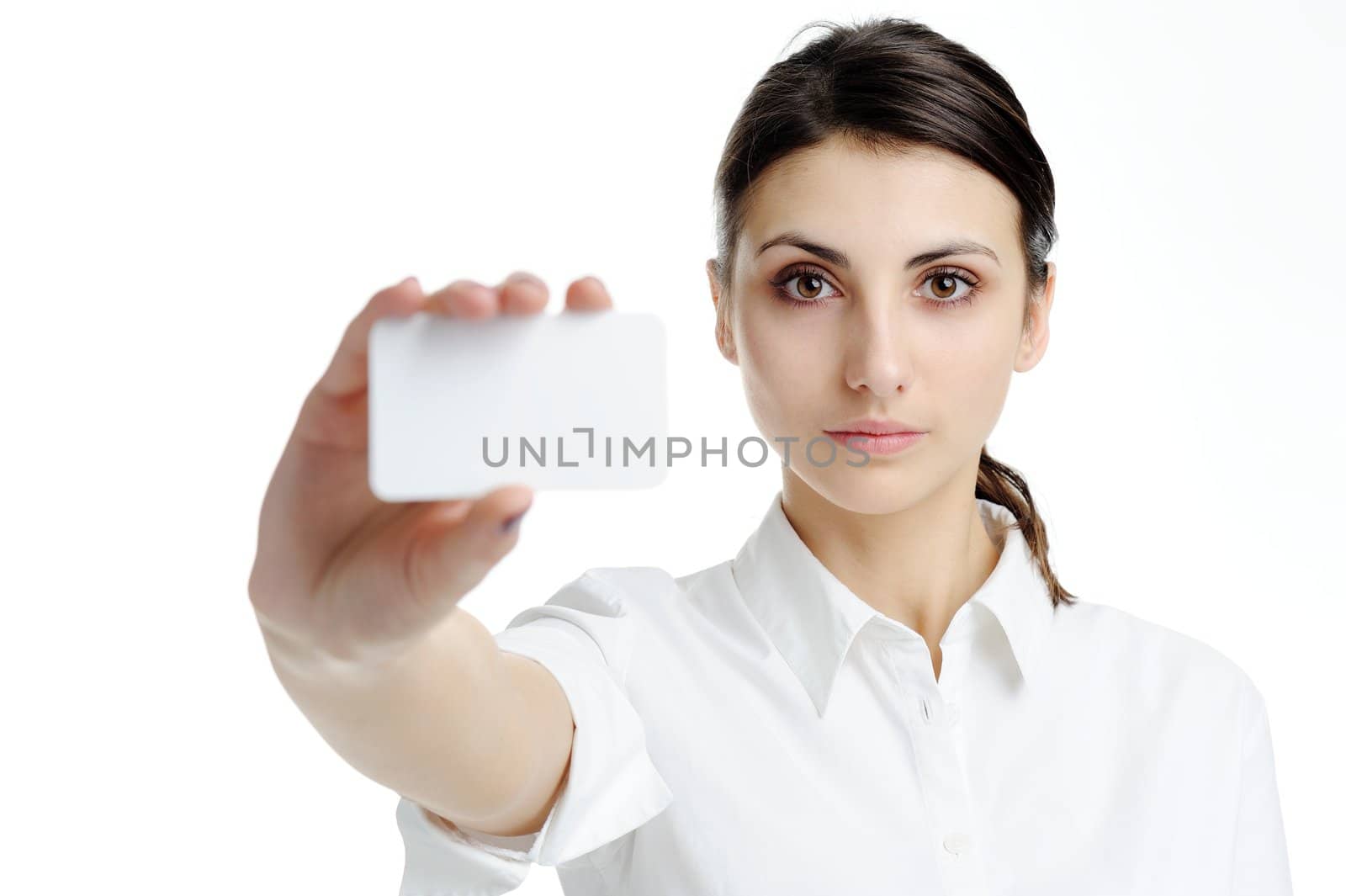 An image of young woman holding blank businesscard in hand