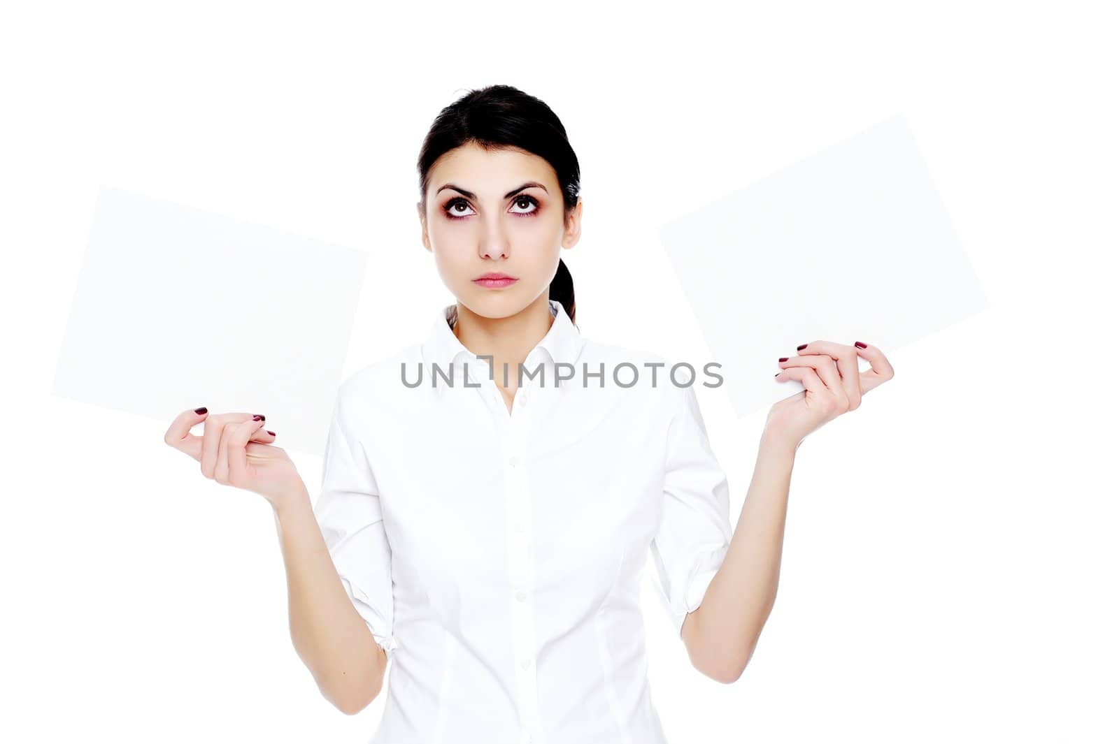 An image of young businesswoman holding sheets of papper