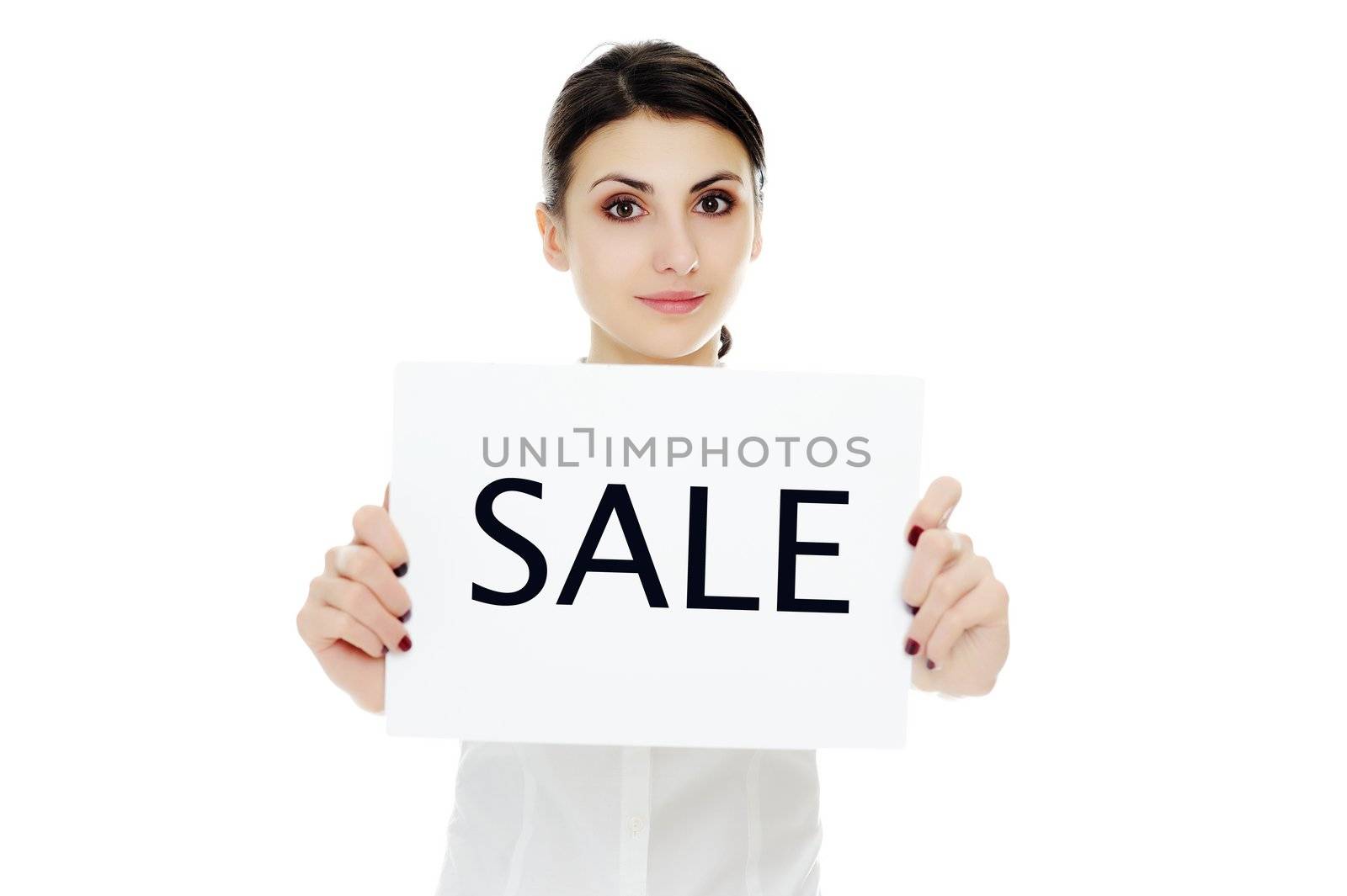An image of young businesswoman holding sheet of papper with inscription SALE