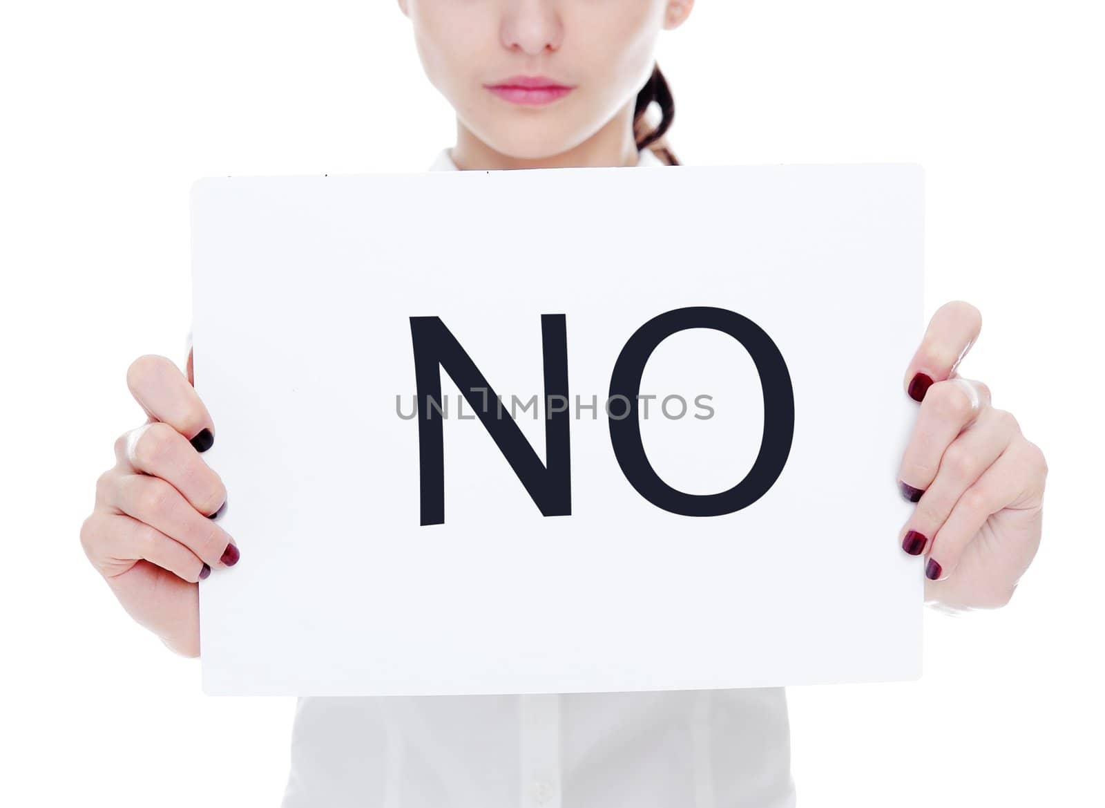 An image of young businesswoman holding sheet of papper with inscription NO