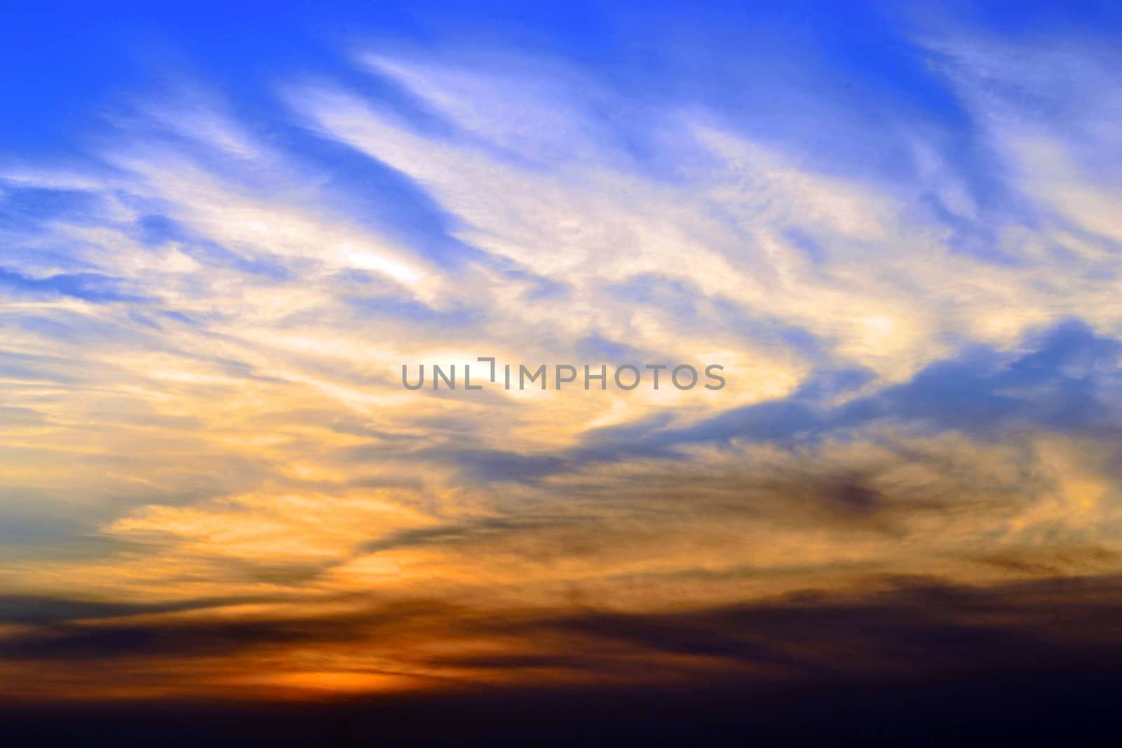 Red clouds in a blue sky