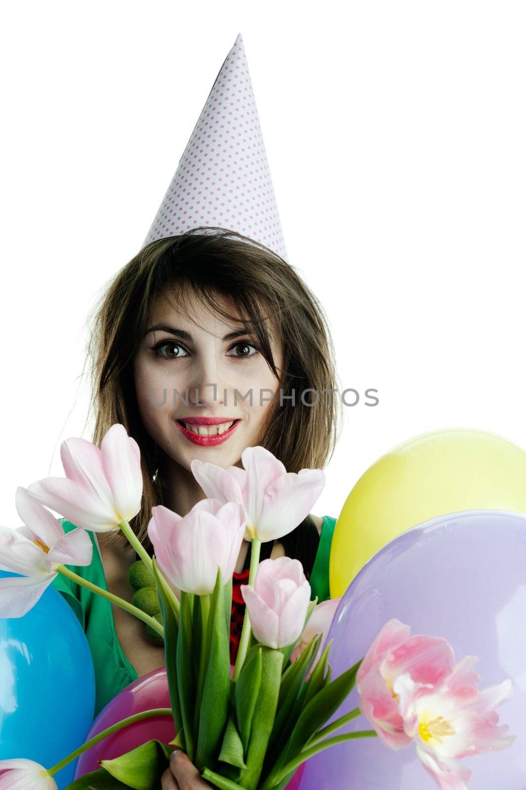 A young beautiful woman with flowers and balloons 