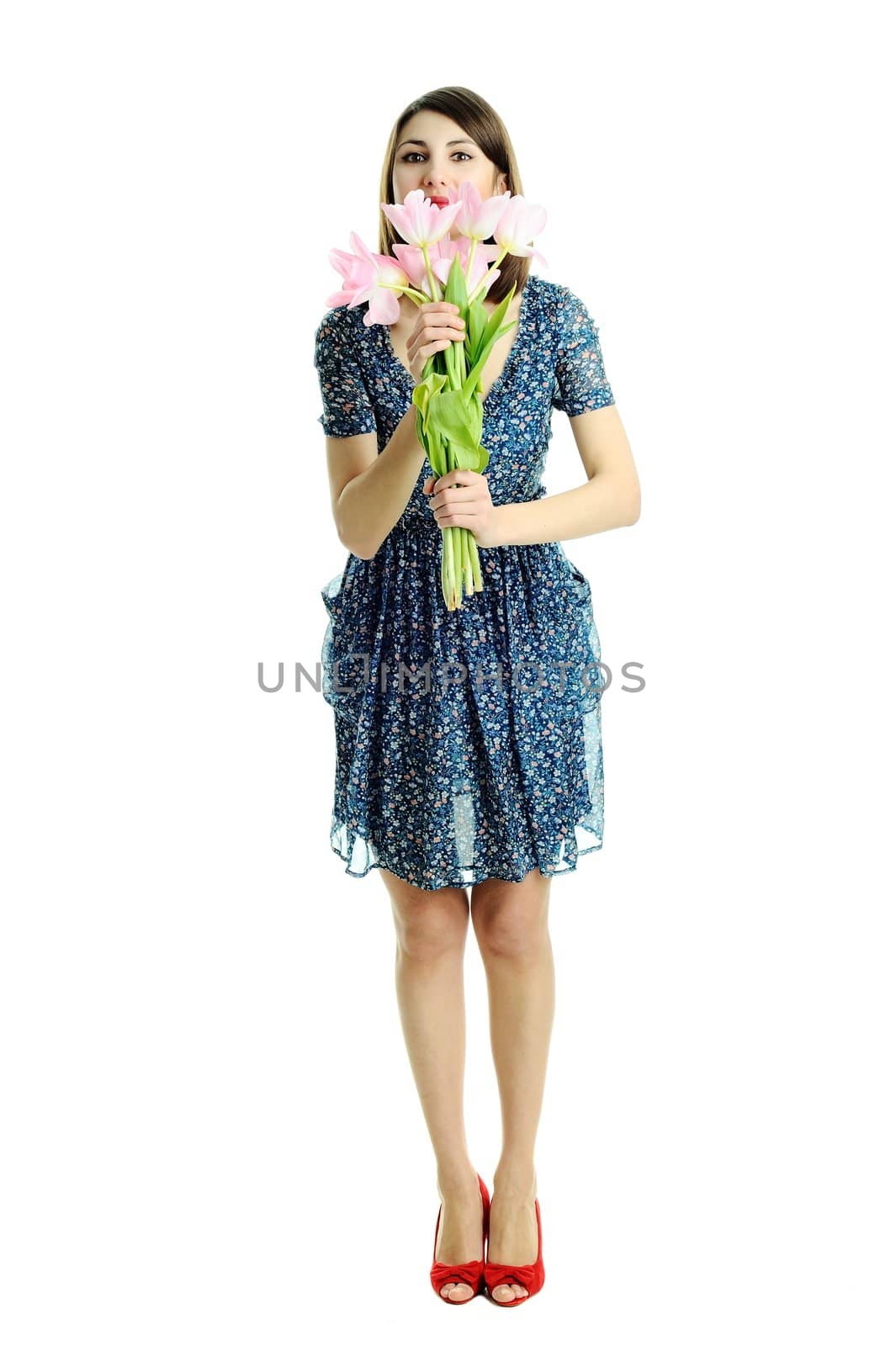 An image of a young pretty woman with pink flowers