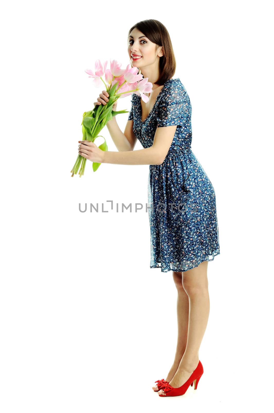 An image of a young pretty woman with pink flowers