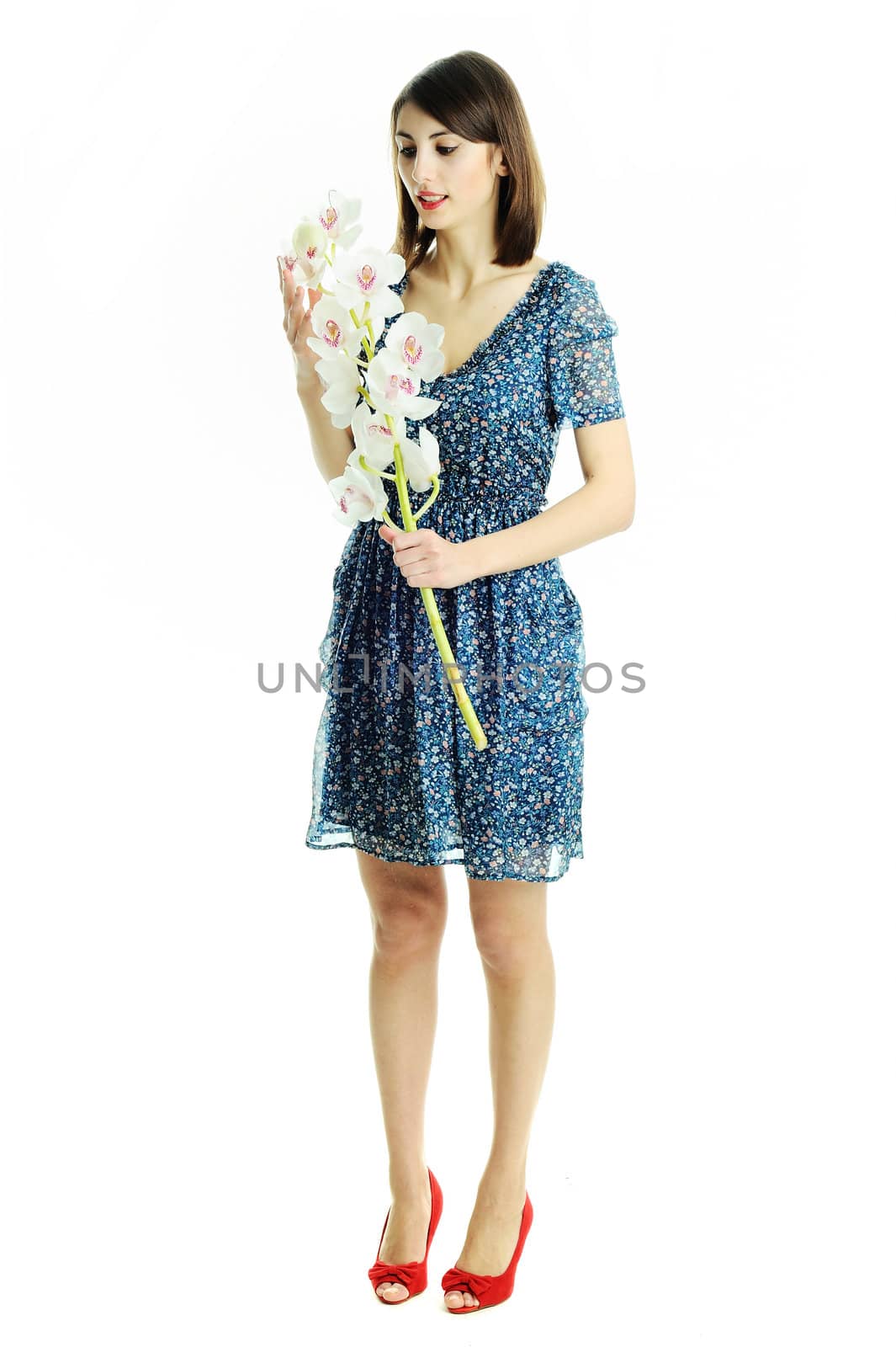 An image of a young pretty woman with flowers