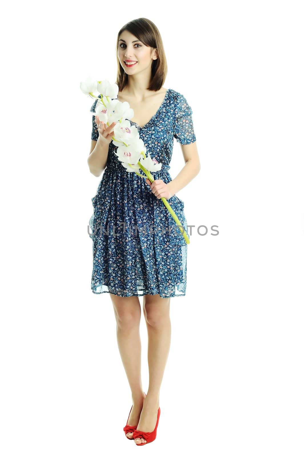 An image of a young pretty woman with flowers