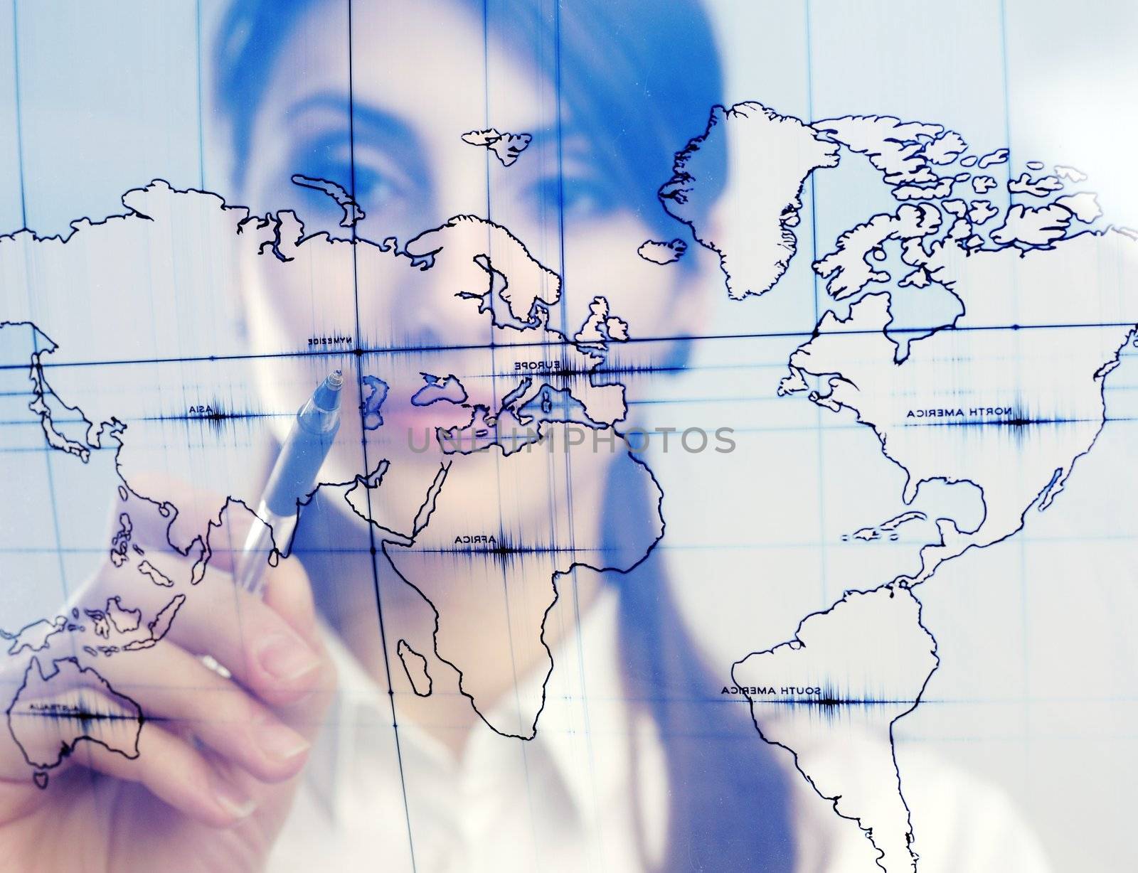 A girl with a map printed on a transparent material