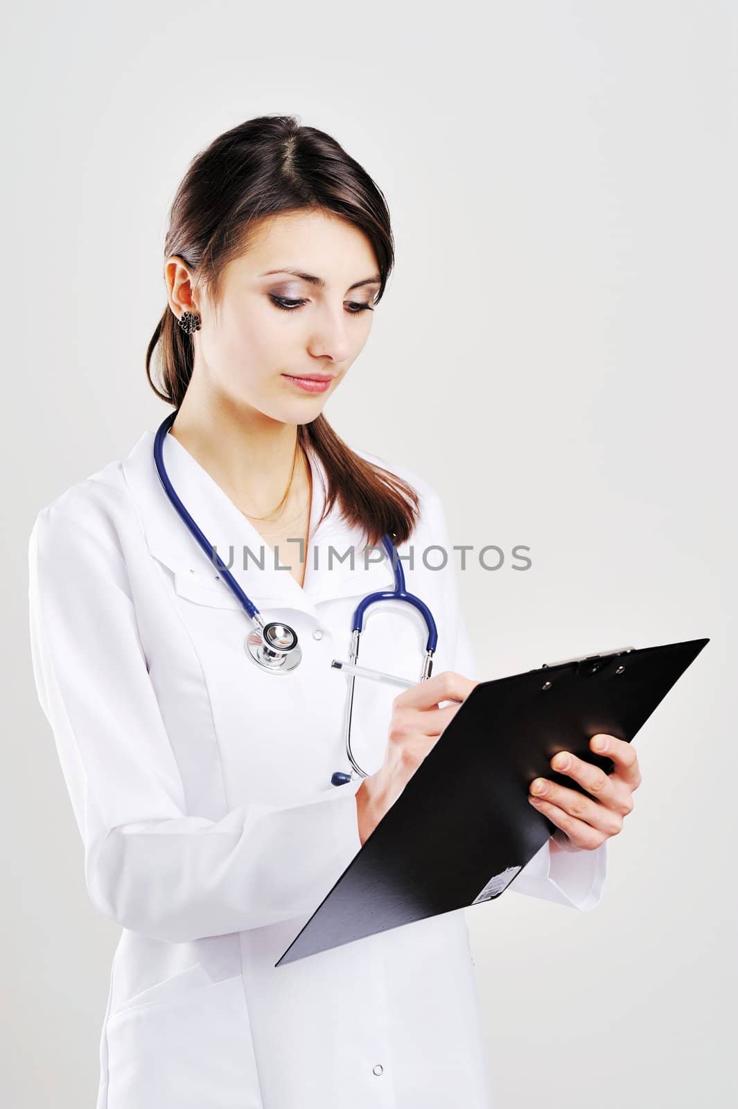 An image of friendly doctor holding chart