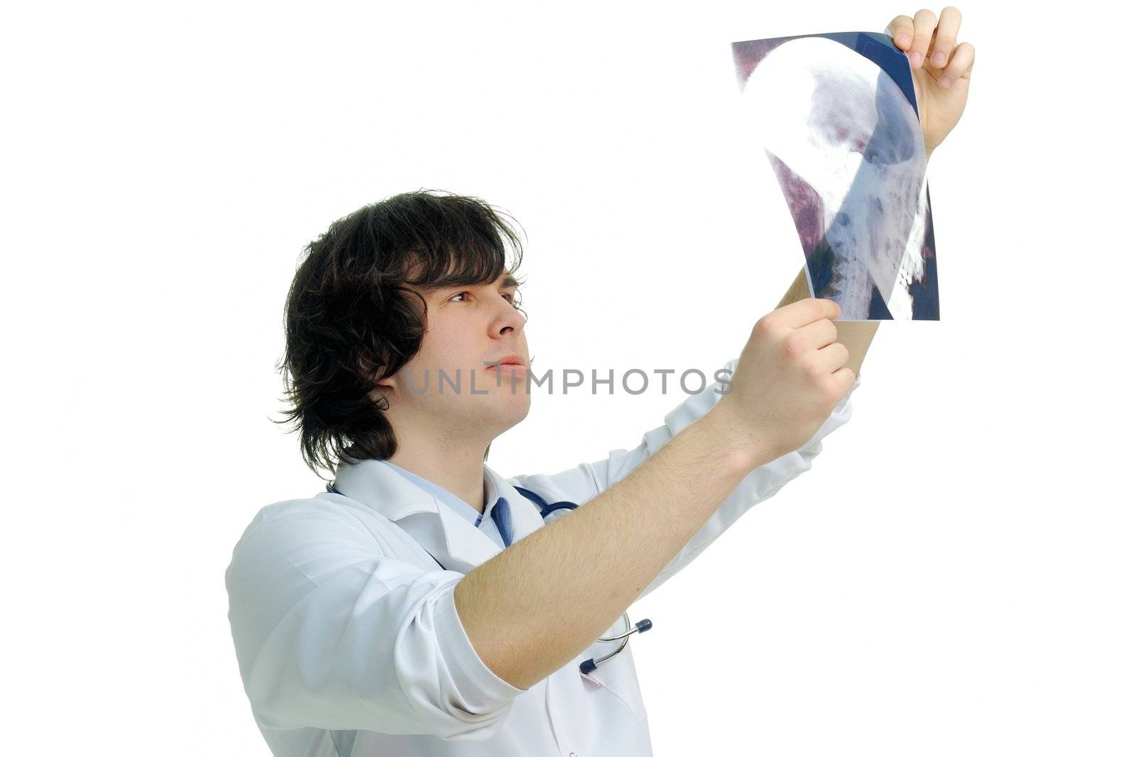 An image of a young doctor looking at x-ray