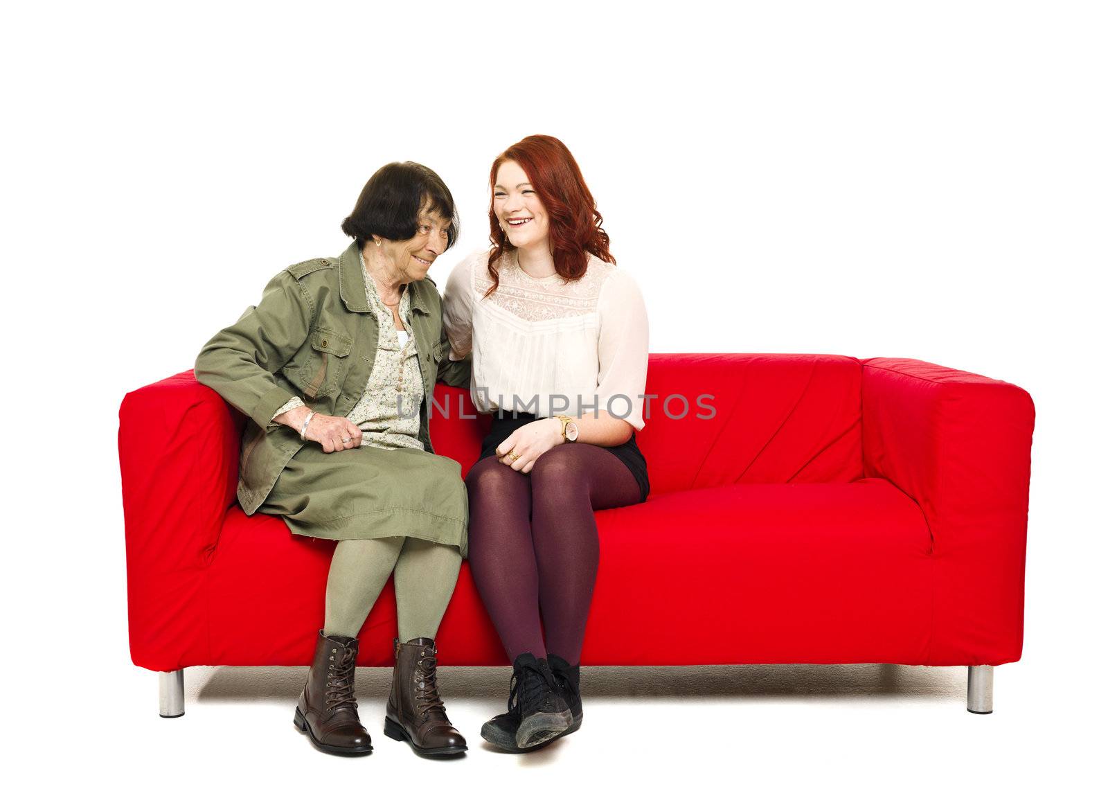 Grandmother and Grandchild sitting in a sofa